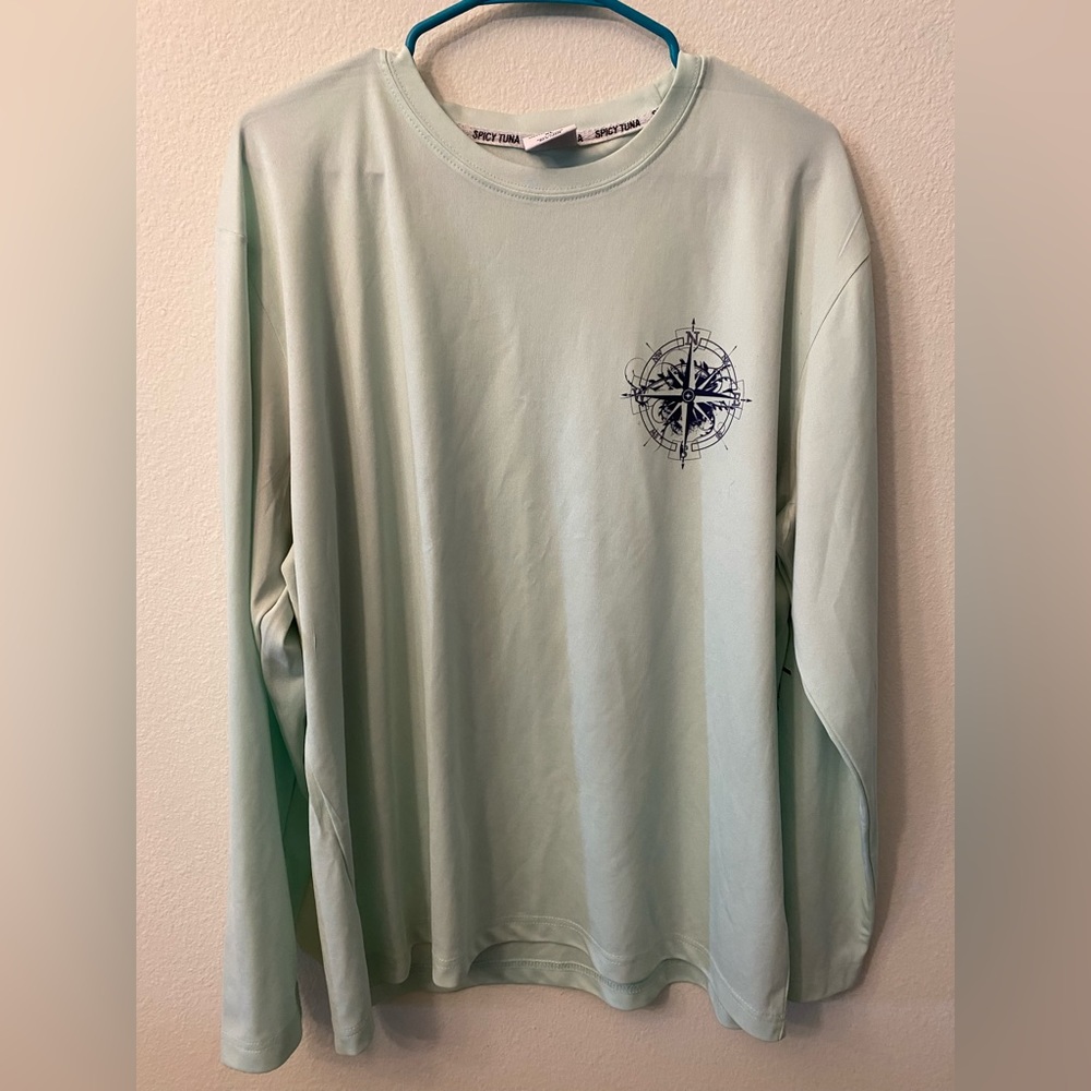 Spicy Tuna long sleeve swim shirt. St. Maarten on sleeve. Size XL.